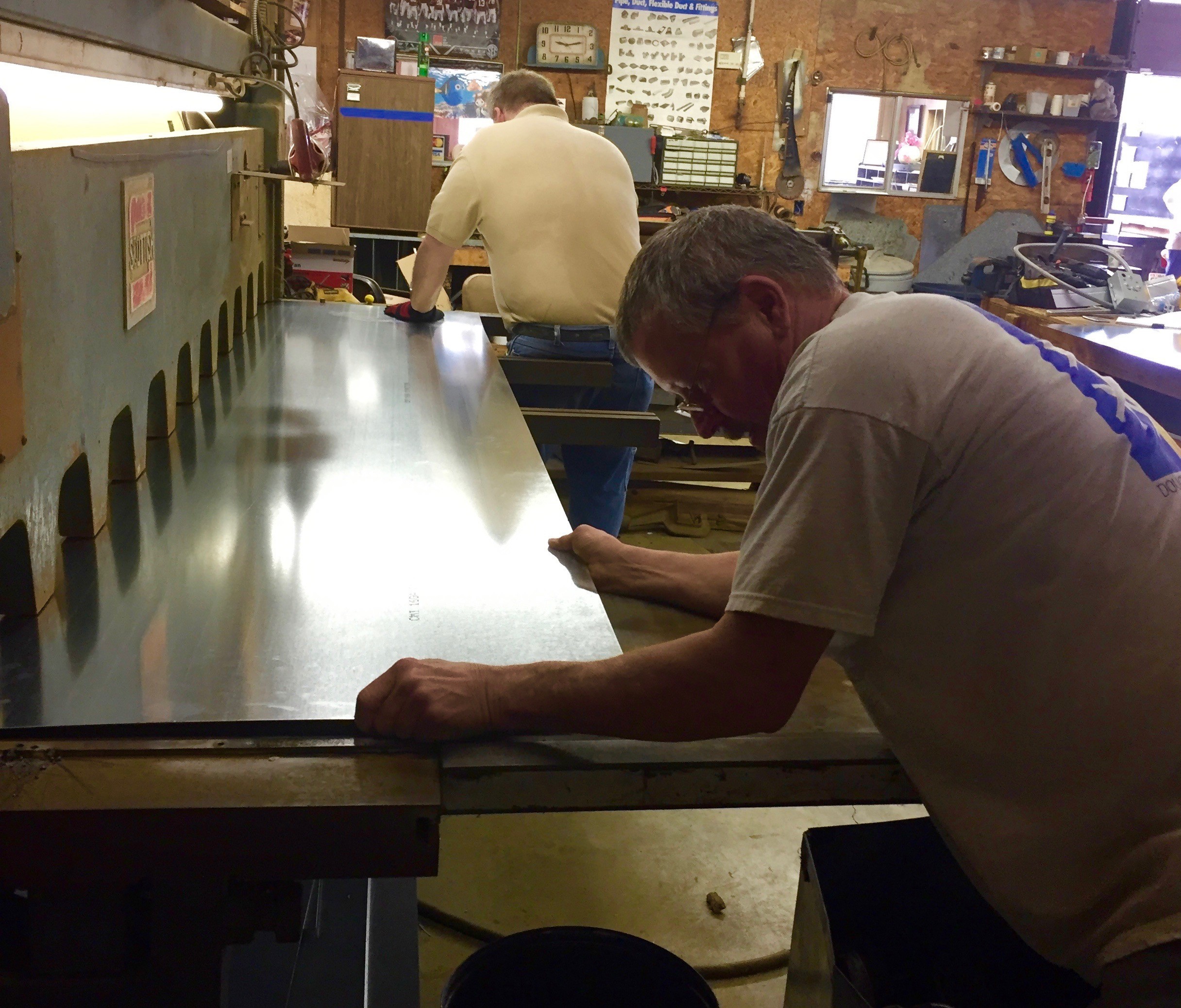 Cutting Sheet Metal to create custom metalwork in our Birmingham AL shop