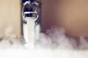 steaming-hot-water-coming-from-faucet