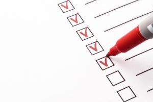 red-pen-marking-things-off-a-to-do-list
